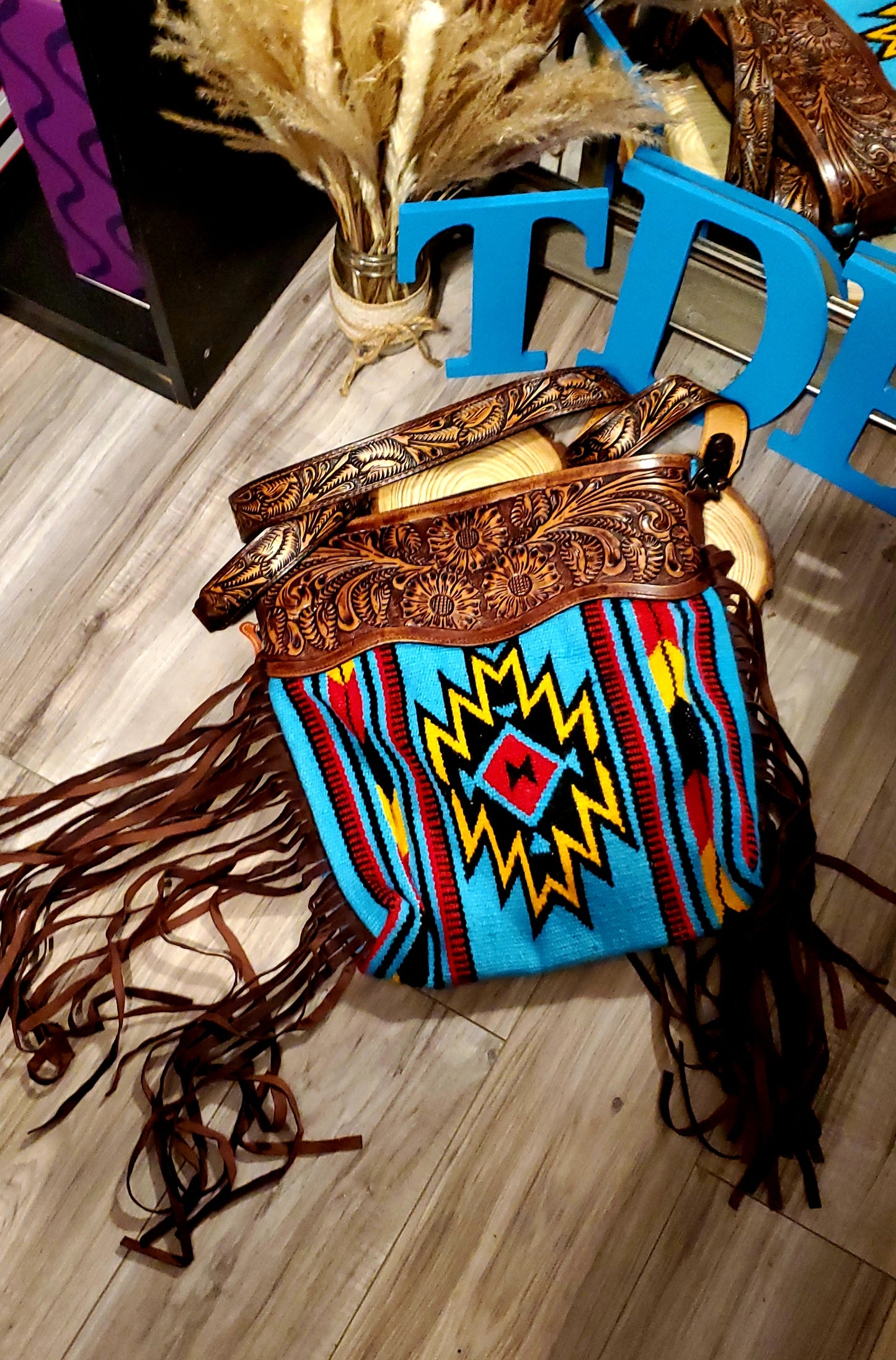 Teal , Black, Red and Yellow Aztec Tooled Leather Purse